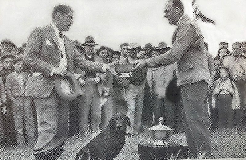 Paul Bakewell receiving the championship trophy for Shed