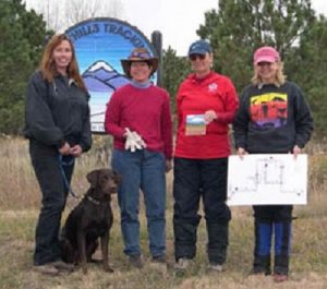 Chocolate Lab earned his Tracking Dog Excellent title